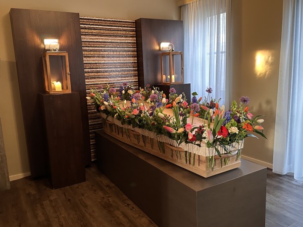 Bloemenband bij de uitvaart